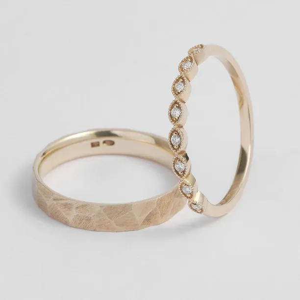 Gold diamond wedding rings LATI Image