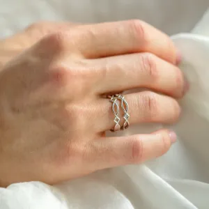 Netradiční snubní prsten s propletením TARANIS Thumbnail