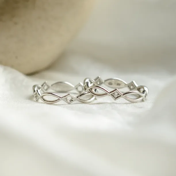 Netradiční snubní prsten s propletením TARANIS Image