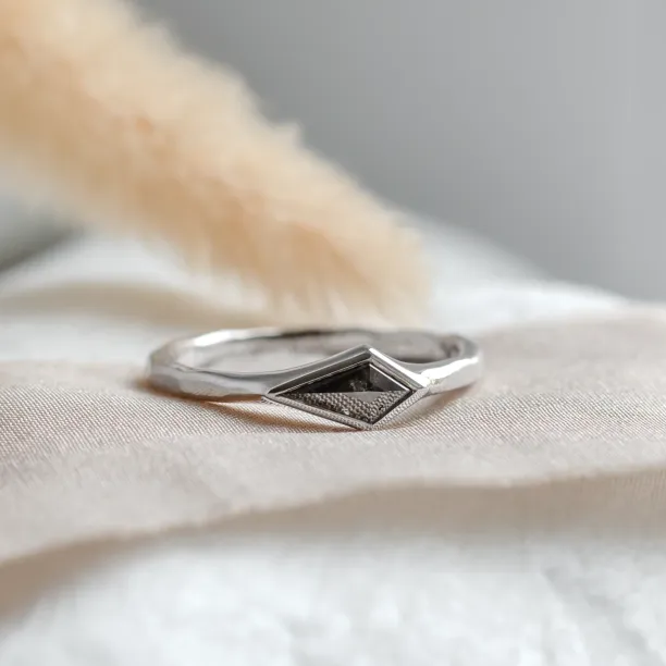 Ring with hammered surface and salt and pepper diamond DART Image