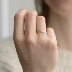 Matte platinum wedding bands with hammered surface ETA