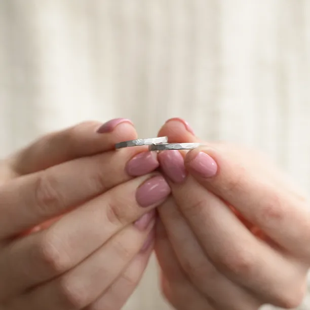 Matte platinum wedding bands with hammered surface ETA Image