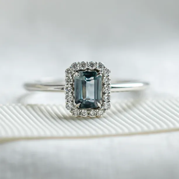 Halo gold ring with teal baguette sapphire and diamonds CELADON Image