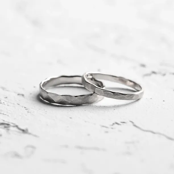 Matte platinum wedding bands with hammered surface ETA Image