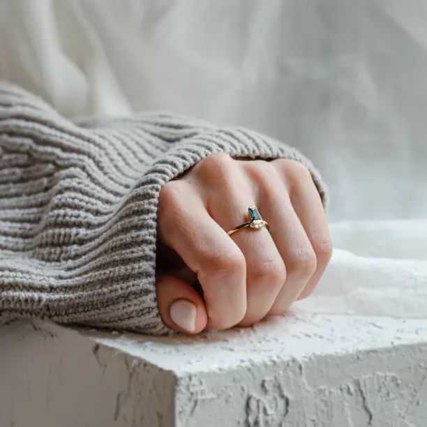 Unusual gold ring with teal sapphire and side diamonds AZRAQ Image