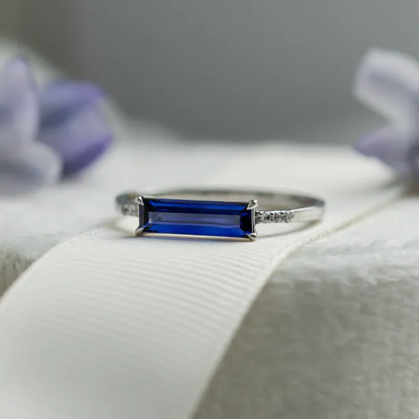 Gold ring with baguette blue lab grown sapphire and diamonds ODETA Image