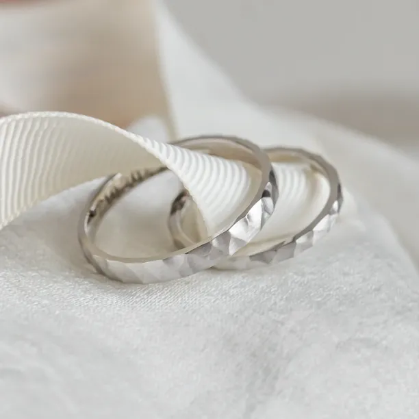 Unusual wedding bands with hammered surface BANG Image