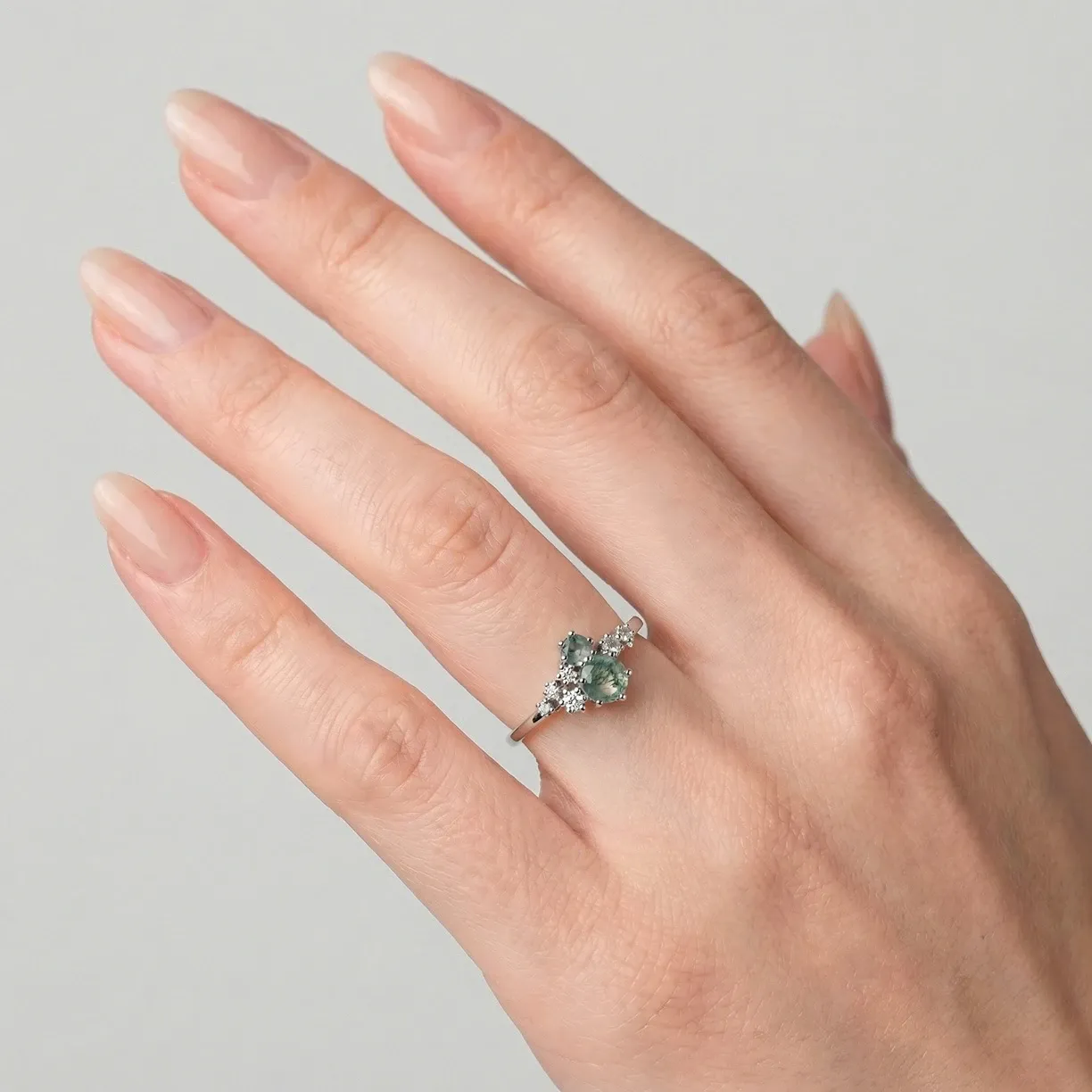 Cluster ring with moss agate and diamonds.