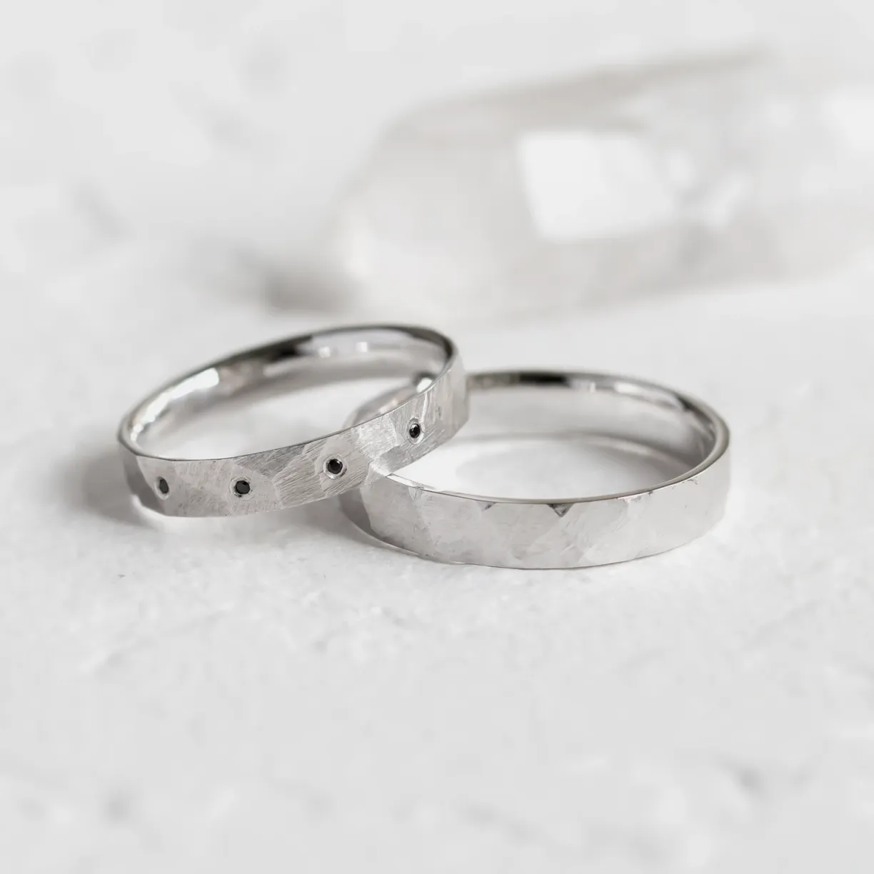 Hammered white gold wedding rings.