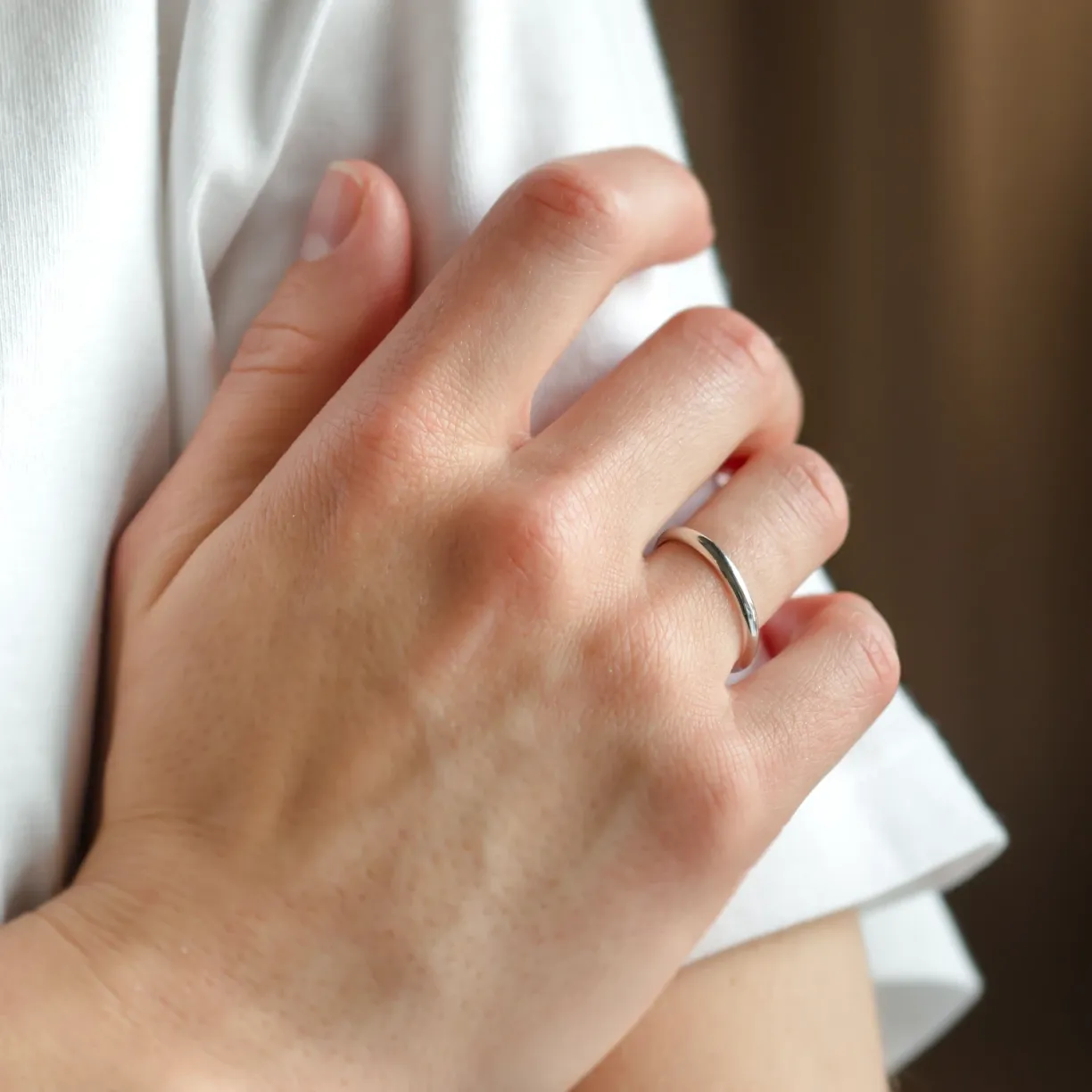 Gold ring on the hand