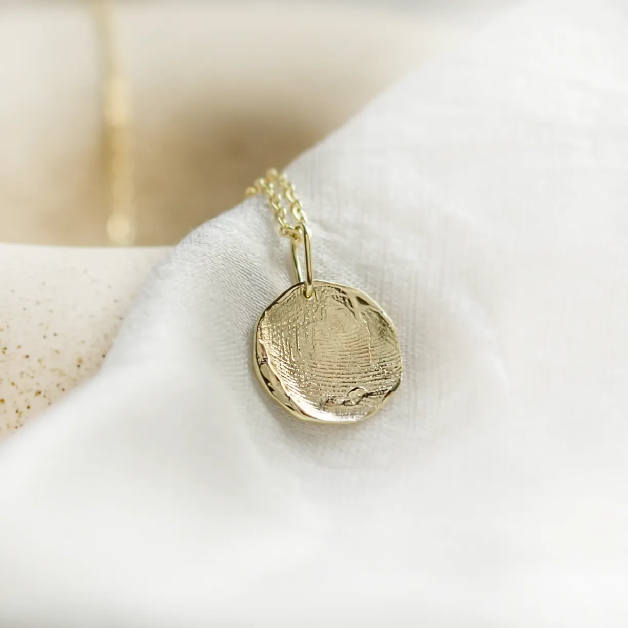 fingerprint_necklace