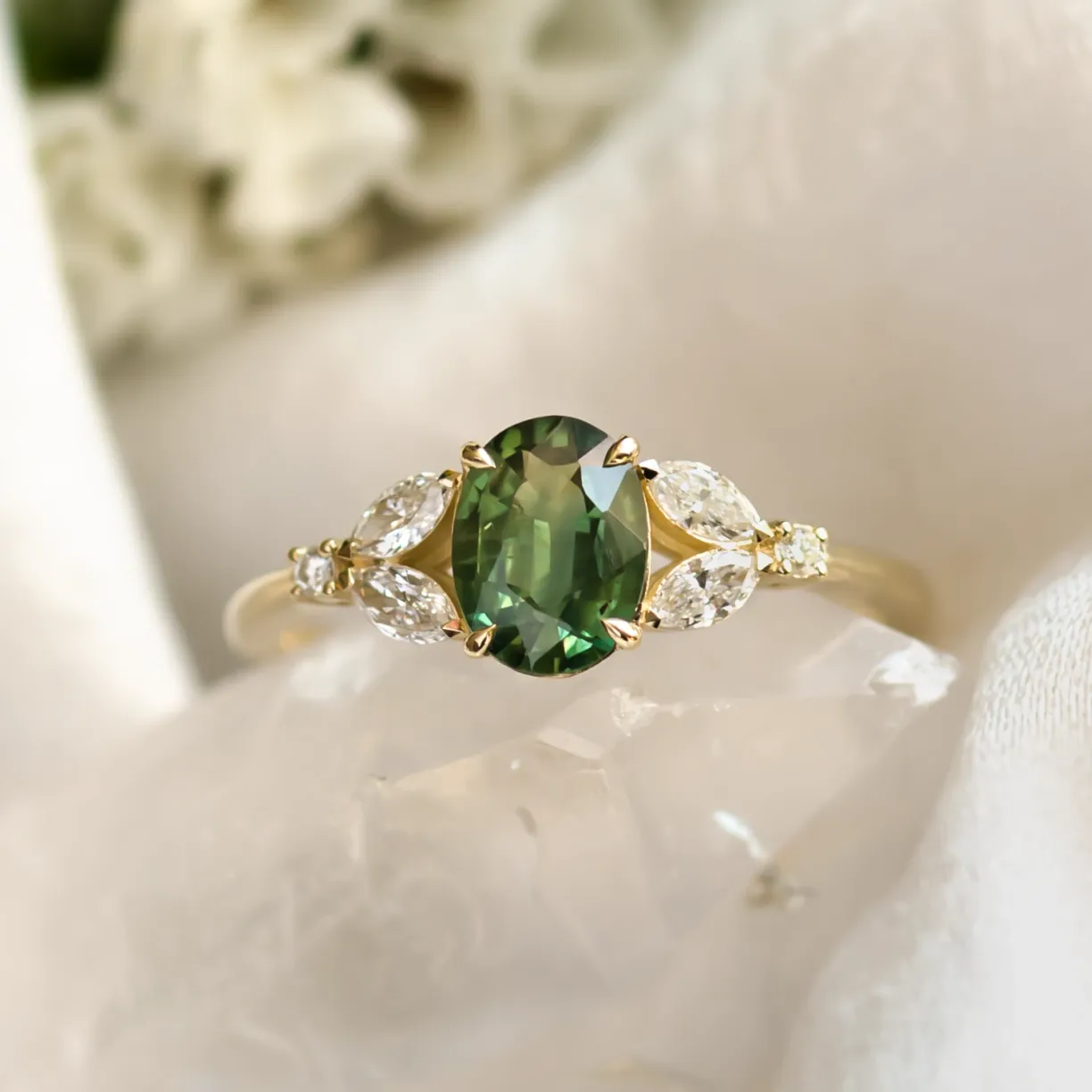 Vintage engagement ring with green sapphire