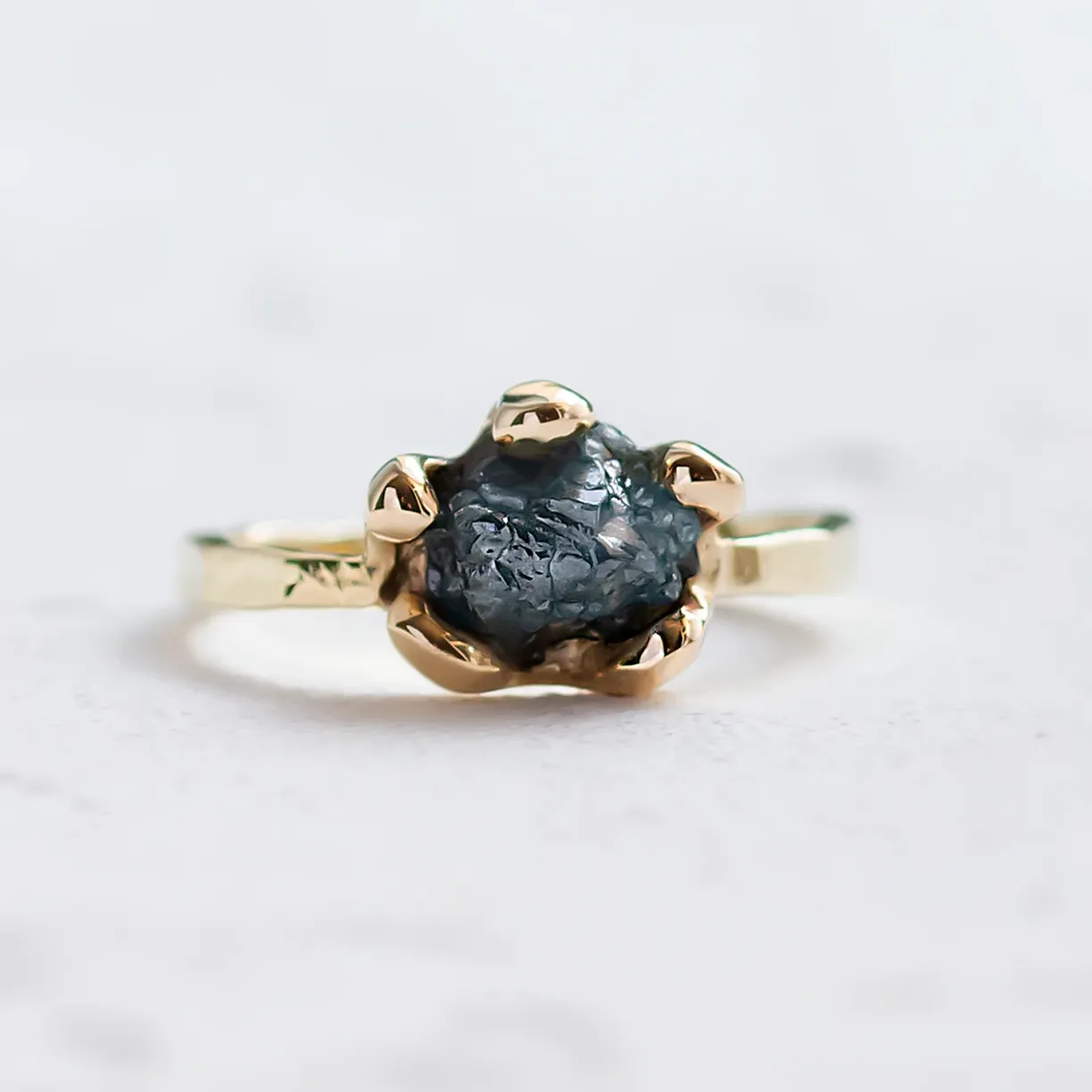rough_diamond_ring_on_the_hand