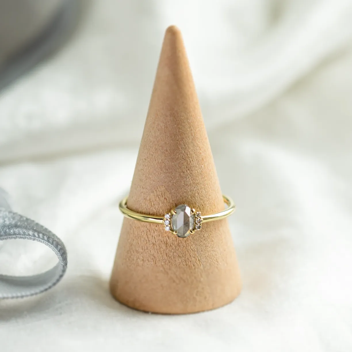engagement ring with salt and pepper diamond